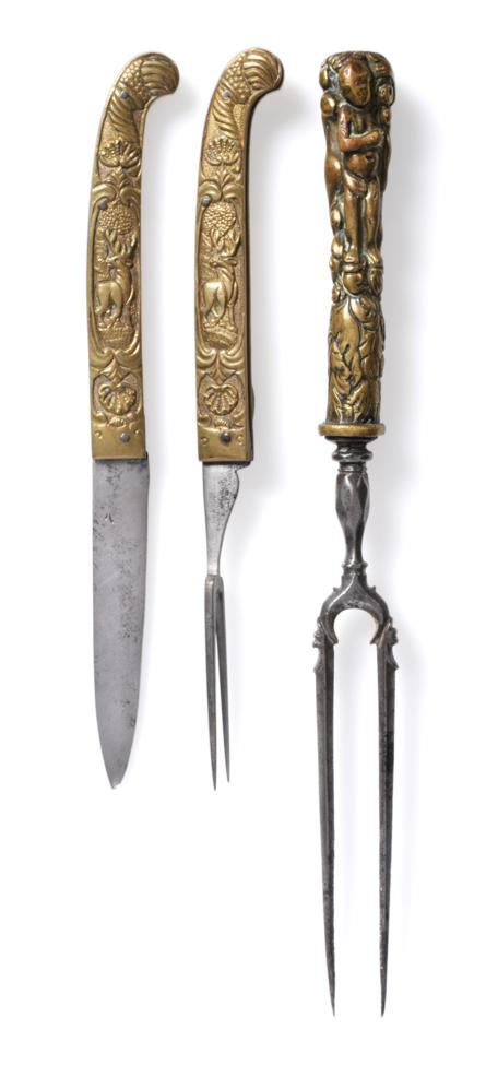 Lot 239 - A German Bronze-Handled Table Knife, 17th century, the handle cast with three standing figures over