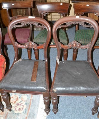 Lot 711 - A set of four early Victorian mahogany balloon back dining chairs, a single mahogany balloon...