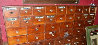 Lot 724 - A bank of Victorian chemists' drawers