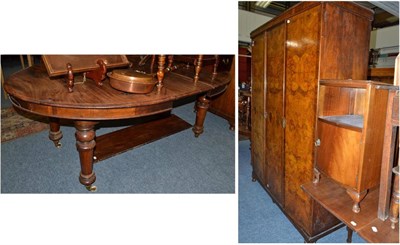 Lot 731 - A walnut triple door wardrobe, bedside cupboard, walnut cased radio, tin bath, leather...