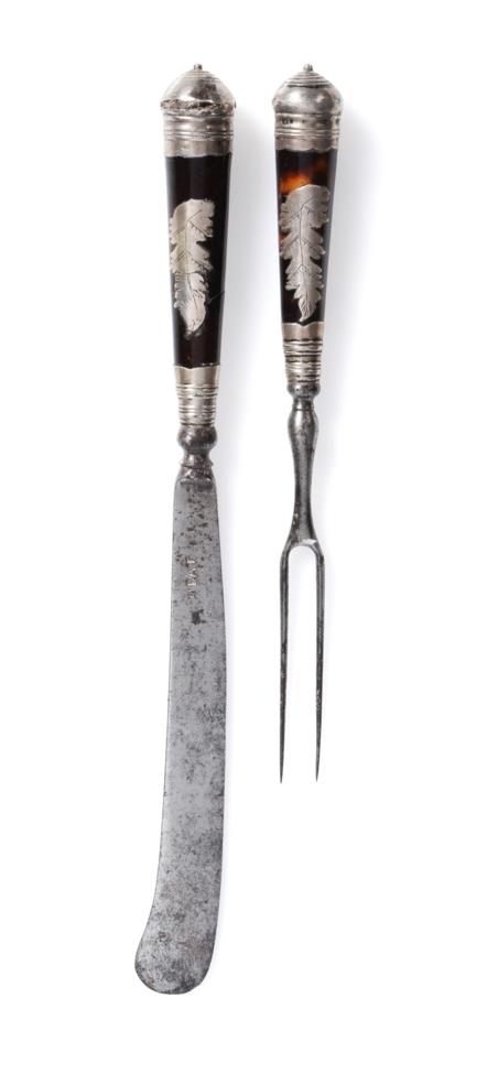 Lot 242 - A Tortoiseshell and Silver-Handled Dessert Knife and Fork, circa 1730, the handles of tapering...
