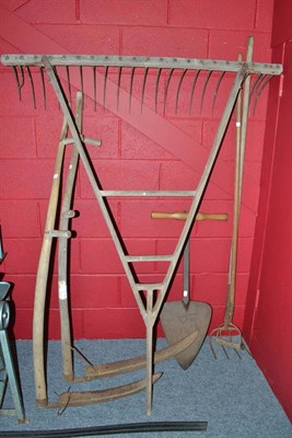 Lot 748 - Hay cutter, muck cowl, hay rake, hoe and two scythes