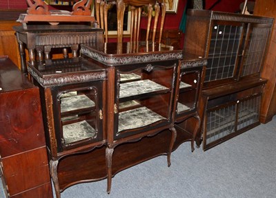 Lot 753 - An oak bookcase with leaded glass door, an Edwardian chiffonier base and a dwarf bookcase with...