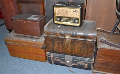 Lot 756 - A 19th century oak trunk, two tin trunks, leather case, a Bakelite cased radio, a stained pine...