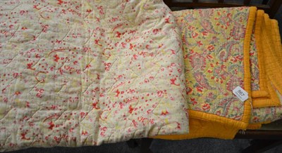 Lot 867 - Yellow cotton and floral paisley quilt with central lozenge, 175cm x 220cm; floral quilt with green