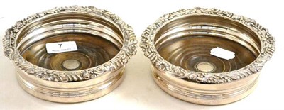 Lot 7 - A pair of silver plated coasters