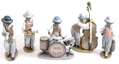 Lot 11 - Five Lladro figures comprising: 'Jazz Bass', 'Jazz Sax', 'Jazz Drums', 'Jazz Horn' and 'Jazz...