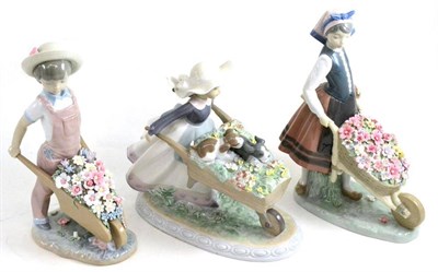Lot 24 - Lladro figure 'A Barrel of Blossoms' and two others (3)
