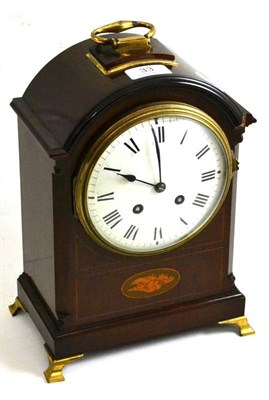 Lot 33 - * A mahogany mantel clock with inlaid decoration