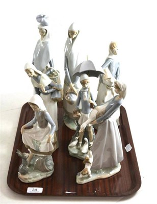 Lot 34 - Seven Lladro figures including Girl with Lamb and Girl with Rabbit