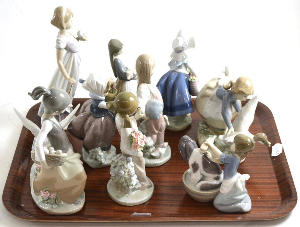 Lot 40 - Lladro figure 'Saturday's Child' and other Lladro figures of children with animals (9)