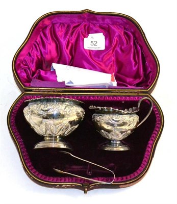 Lot 52 - Cased silver sugar bowl, jug and tongs, London 1893