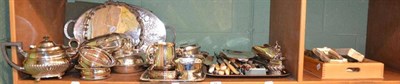 Lot 74 - Two shelves of assorted silver plate including entree dishes, cutlery, trays, etc
