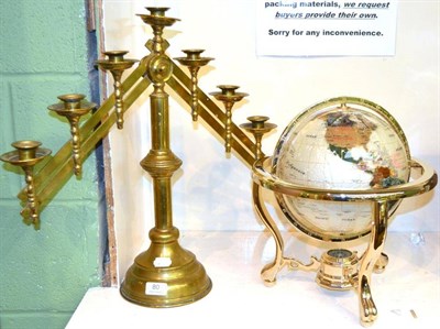 Lot 80 - A brass adjustable candlestick and a modern globe