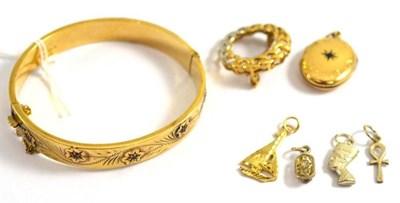 Lot 120 - A 9ct gold bangle, 9ct gold brooch, 9ct gold locket, etc