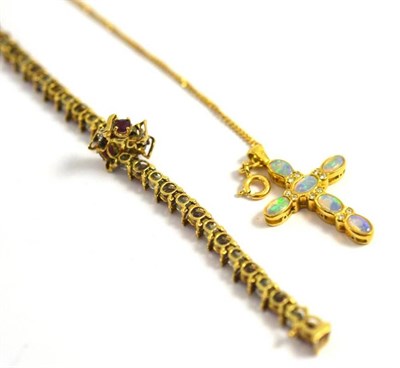 Lot 127 - An 18ct gold opal set cross pendant with attached chain with clasp stamped '750' and a 9ct gold...
