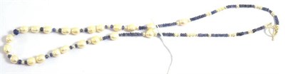 Lot 133 - A tanzanite and cultured pearl necklace