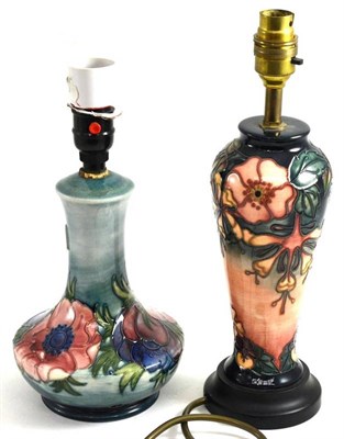 Lot 178 - A Walter Moorcroft Anemone pattern table lamp, on a blue wash ground, impressed factory marks...