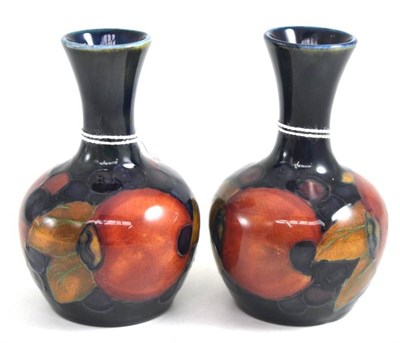 Lot 200 - A pair of William Moorcroft Pomegranate vases, 10cm high