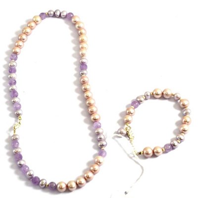 Lot 216 - An amethyst and cultured pearl necklace and bracelet