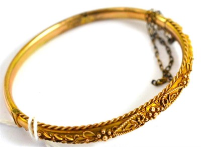 Lot 228 - A 9ct gold Victorian bangle, cased