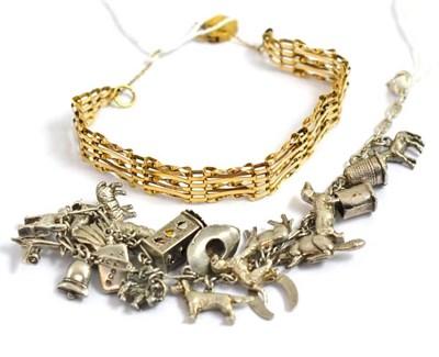 Lot 234 - A 9ct gold gate bracelet and a silver charm bracelet