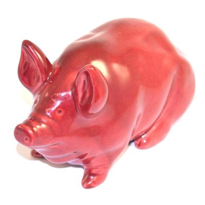 Lot 252 - A small Wemyss pig, with a claret ground, impressed WEMYSS WARE R.H.S, 19cm long