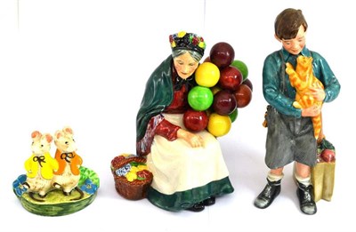 Lot 273 - Two Royal Doulton figures ";The Old Balloon Seller"; HN1315 and ";Welcome Home"; HN3299 and a...