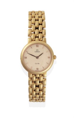 Lot 303 - A Lady's 18ct Gold Wristwatch, signed Omega, model: De Ville, circa 2000, quartz movement,...