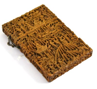 Lot 311 - A Cantonese carved boxwood card case, carved in low relief with figures in a landscape