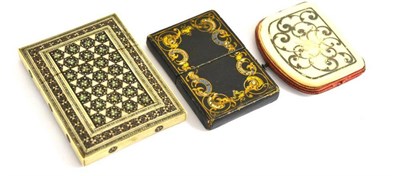 Lot 313 - A tooled leather card case with flip-out aide memoire, an Indian card case and a purse with...