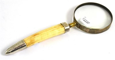 Lot 317 - # A silver mounted tusk handled magnifying glass