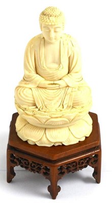 Lot 320 - Japanese elephant ivory Amitabha (Buddha) seated in mediative pose on lotus dais, circa 1910,...