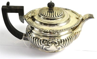 Lot 323 - A silver teapot