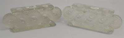 Lot 337 - A pair of Lalique Auriac pattern candlesticks, etched ";Lalique France"