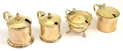 Lot 348 - * Four silver condiments with blue glass liners