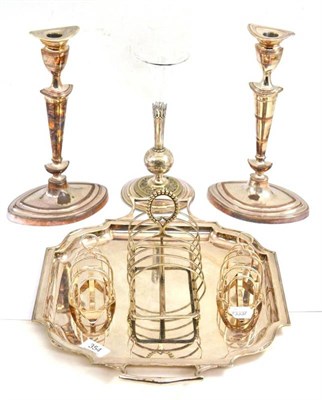 Lot 354 - # A pair of Sheffield plate candlesticks, three plated toast racks, silver plated tray and an...