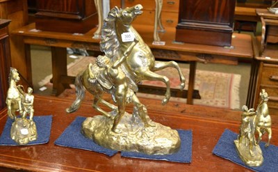 Lot 395 - Three bronzed Marley horses signed Coustou