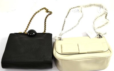 Lot 400 - Lulu Guinness cream patent Anna Bow bag with chain link shoulder strap, red lips on black...