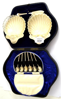 Lot 409 - * A pair of silver shell butter dishes with glass liners and six silver coffee spoons