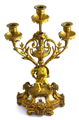 Lot 423 - A 19th century French gilt metal and porcelain mounted three branch candelabra