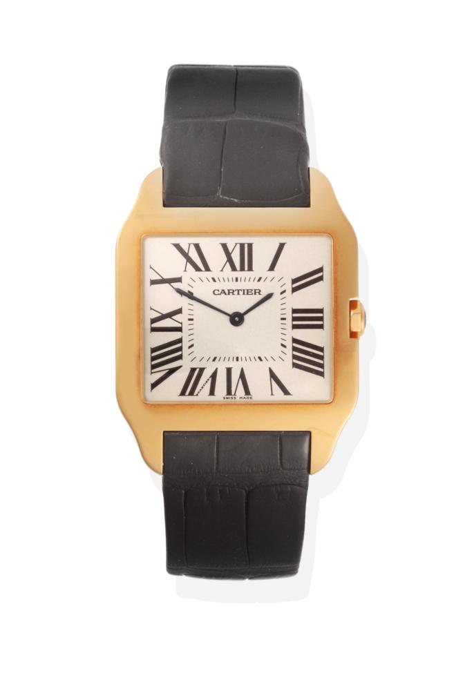 Lot 324 - An 18ct Gold Wristwatch, signed Cartier, model: Santos Dumont, ref: 2649, circa 2004, lever...