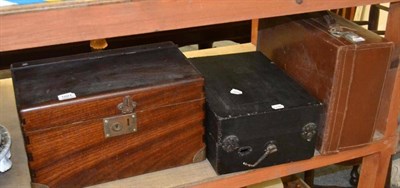 Lot 1021 - * A mahogany hinged box, portable gramophone, leather case and two plaster plaques