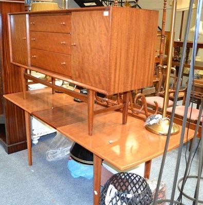 Lot 1052 - 1960's Gordon Russell teak dining room suite, comprising extending table, the shaped...