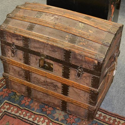 Lot 1066 - Leather mounted dome top travel trunk