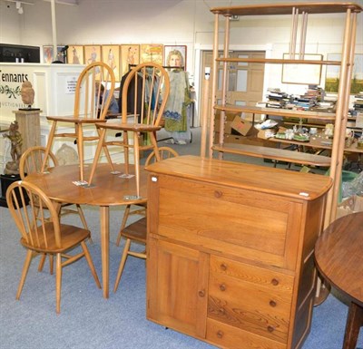 Lot 1081 - A set of six Ercol ash and elm Windsor dining chairs, stamped and one labelled, an Ercol elm dining