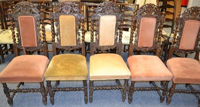 Lot 1089 - A set of six Victorian carved oak dining chairs, three upholstered in pink velvet, three in yellow