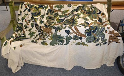 Lot 1093 - 20th century crewelwork bed cover in the Jacobean style depicting birds, squirrels, fruit,...