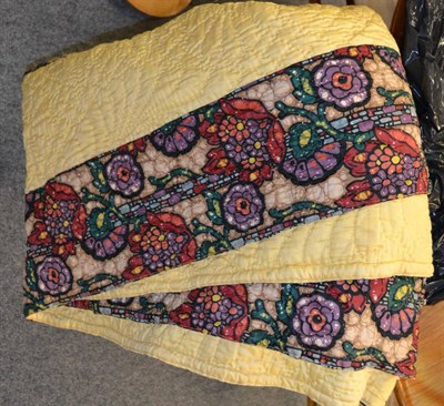 Lot 1126 - * Double yellow ground quilt with floral batik style inserts and edging