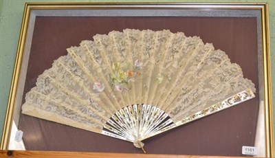 Lot 1161 - Late 19th century mother-of-pearl fan with pierced and painted sticks, with a lace mount hand...